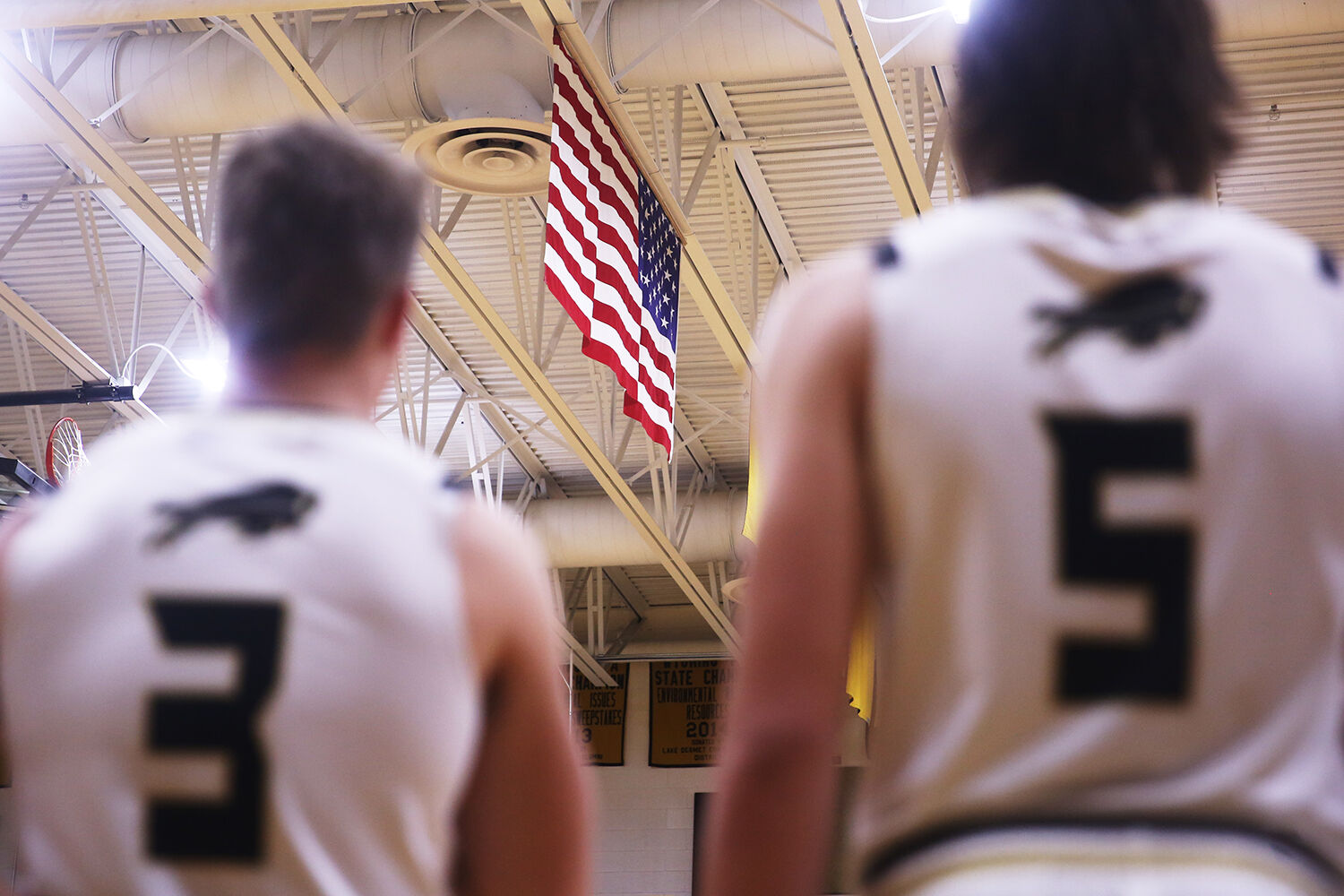 Hyrum Hatch, left, and Hunter Stone stand in line with the team